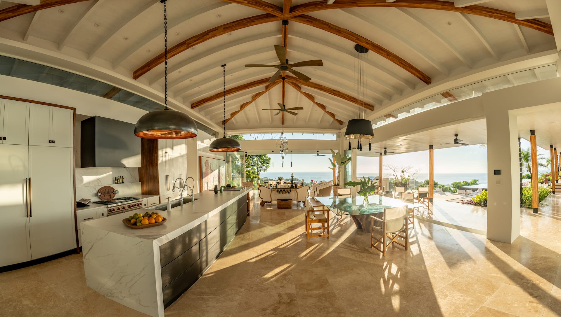 Luxury open-plan residence in Dominical, Costa Rica with architectural pendant lighting and ocean views